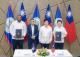 圖說四:外交部長林佳龍(右二)與貝里斯外交暨外貿部長馮賽卡(Francis Fonseca,左二)見證雙方代表簽署「臺灣加勒比海共榮學院計畫」合作意向書。