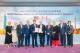 3.Minister Wu poses for a photo with members of the visiting delegation.