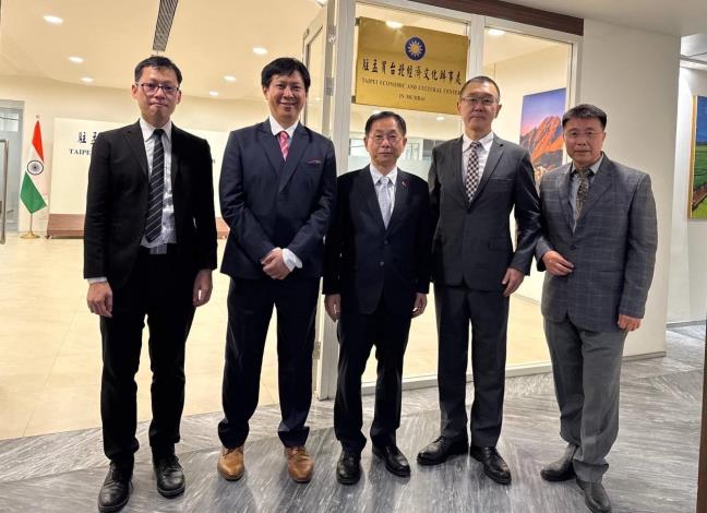 4. Ambassador Ger (center), Director General Chang (second right), and TECC in Mumbai personnel pose for a photo in front of the center.