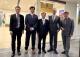 4. Ambassador Ger (center), Director General Chang (second right), and TECC in Mumbai personnel pose for a photo in front of the center.