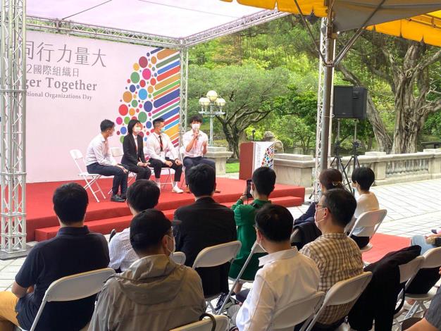 6. Young students listen attentively to youth representatives sharing their experience participating in the APEC Voices of the Future program.