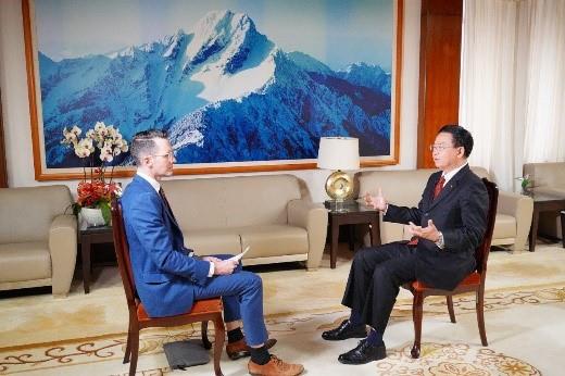 Foreign Minister Wu gives an interview to the Australian Broadcasting Corporation correspondent Bill Birtles